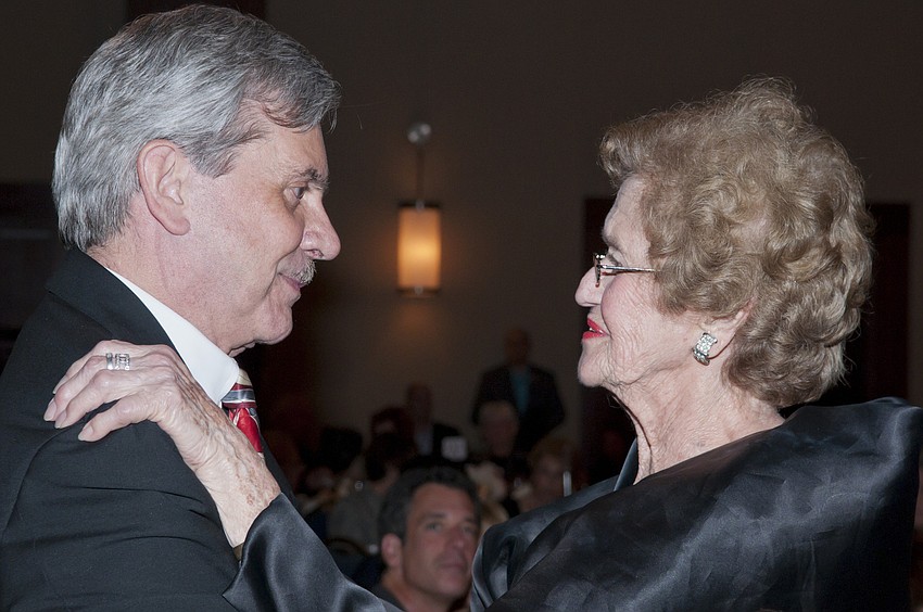 Arthur Guilford collects his hug from Betty Schoenbaum