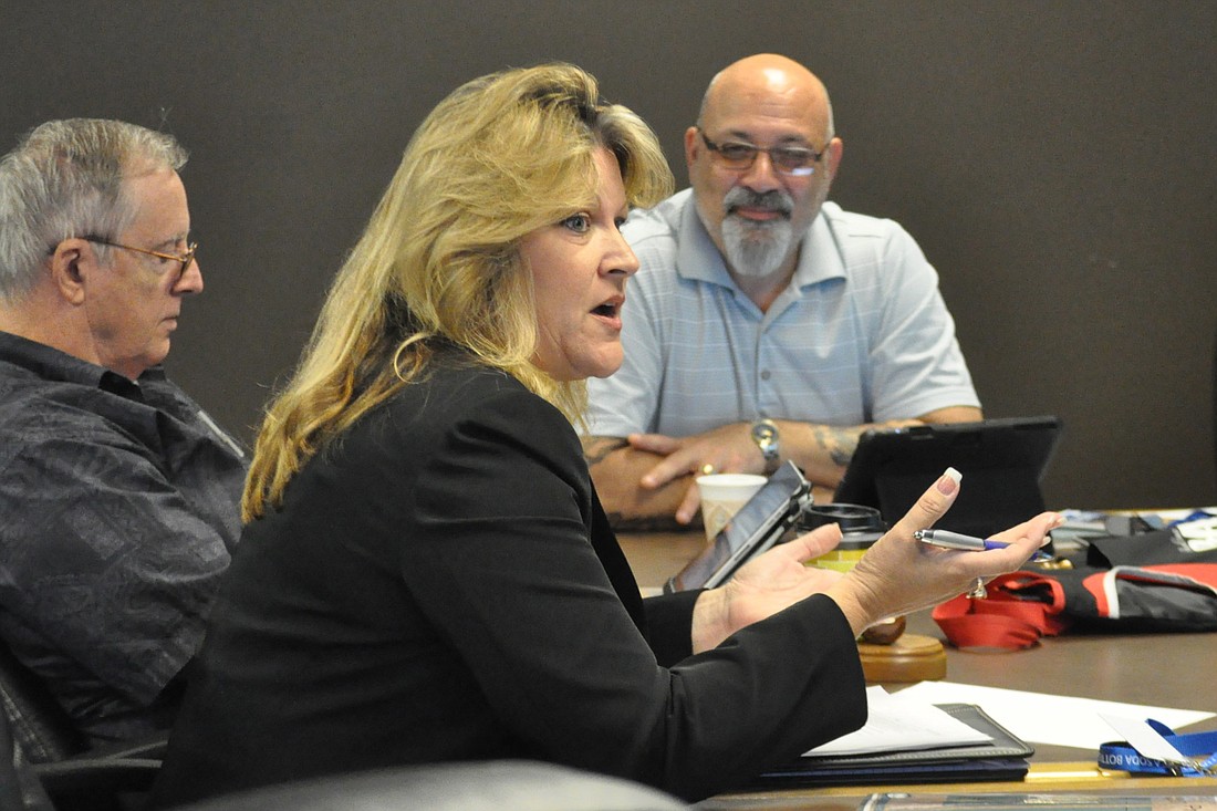 Councilwoman Heidi Shipley speaks at a City Council workshop. Councilman Bill McGuire is at the far left, and Councilman Steve Nobile is at right. (File photo)