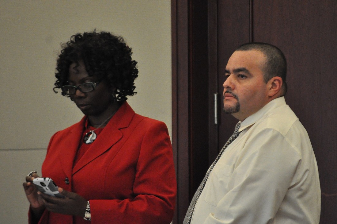 Waldemar Rivera, right, with attorney Regina Nunnally (Photo by Jonathan Simmons)