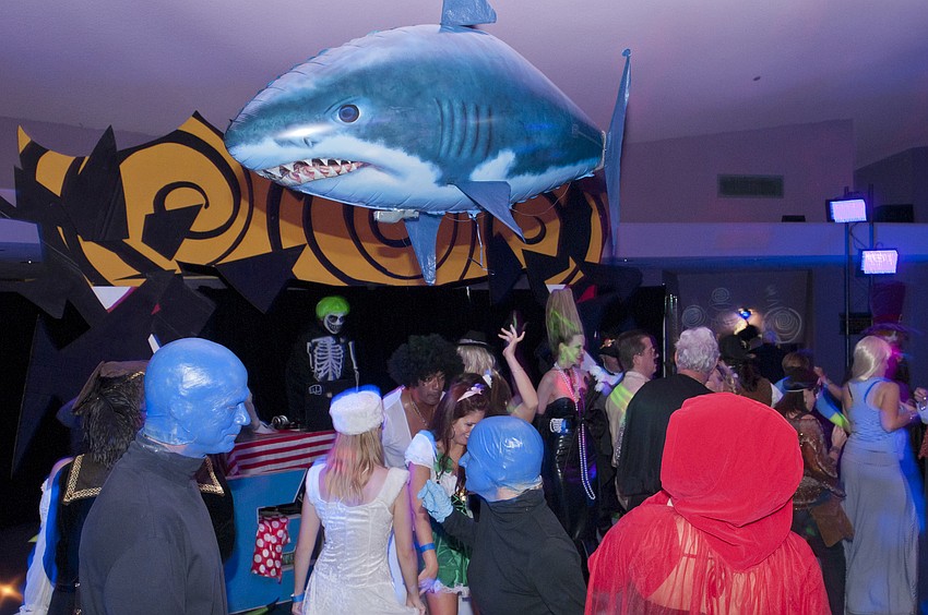 A radio controlled flying shark patrols the dance floor
