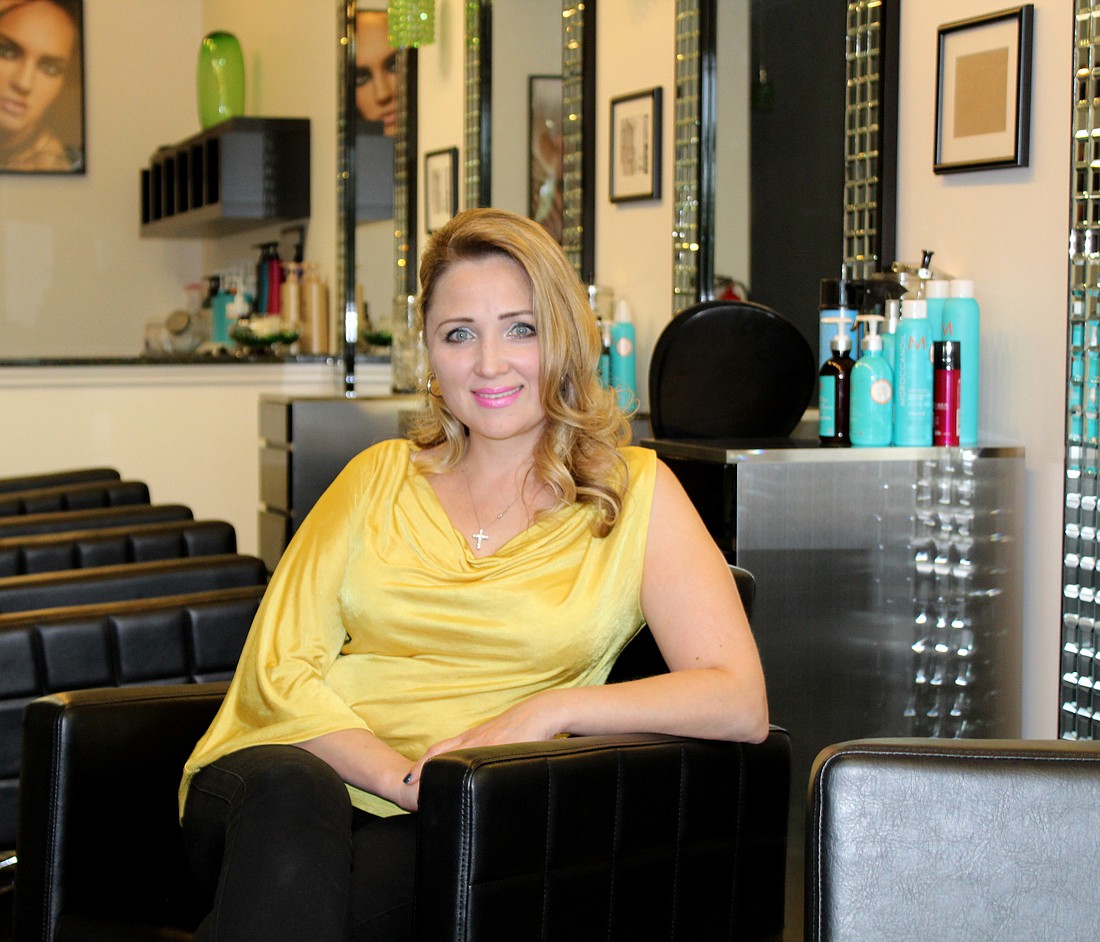 Emerald Day Spa owner, Jenny Marafurova, has organized a Cut-a-thon on Sunday, April 24, to help the Higgins family with medical bills. Photo by Jacque Estes
