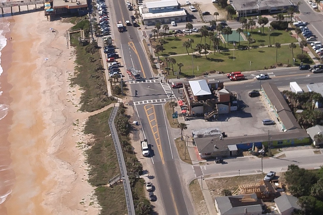 The container spilled about 300 gallons of acid on the east side of Oceanshore Boulevard just north go the intersection with State Road 100. (Photo courtesy of the Flagler County communications office)