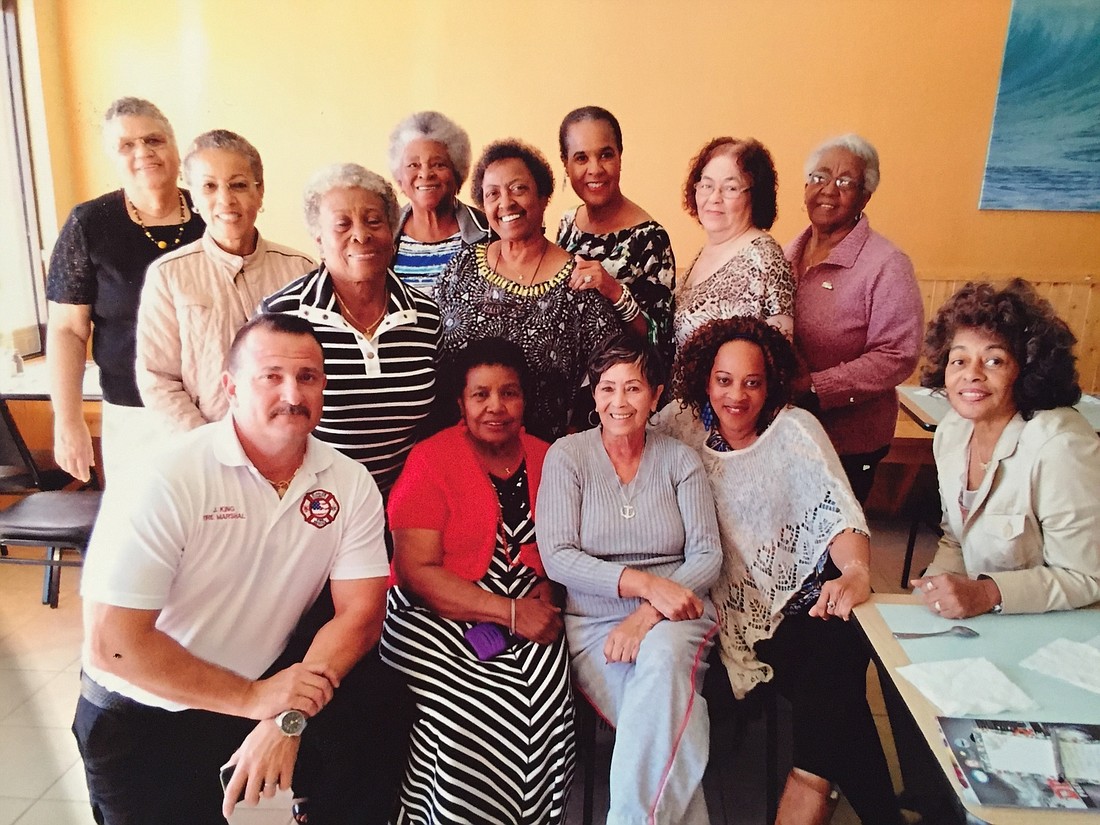 Back row, left to right:Lucy Davis, Marilyn Wilson, Alma Robinson, Brenda Davenport, Betty Flakes, Claudia Davis, Mildra Jackson and Gail Seeney. Front row: Chief Fire Marshall John King, Geraldine Morris, Patricia Webster, Chenita Johnson and June Bethel