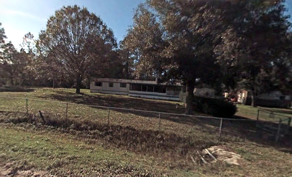 The four dogs broke out of a fenced yard surrounding a mobile home on Forest Park Street, according to a Sheriff's Office report. (Image from Google Maps)