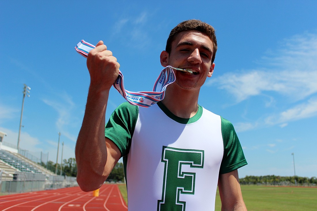 Justin Pacifico runs a 1:52 to capture the State 4A 800-meter championship. Photos by Jeff Dawsey