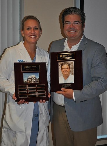 Florida Hospital Flagler chief of staff and emergency medicine physician Dr. Kristin McCabe (left) presents Mucciolo (right) the Physician of the Quarter award. Courtesy photo