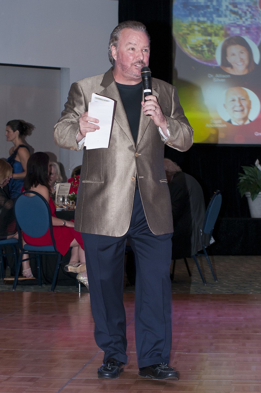 Michael Klauber conducts the live auction