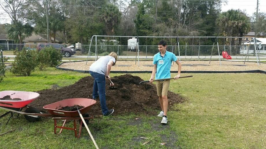 Andrey Chebotaev, a member of Palm Coast Boy Scout Troop 2709,  works in Bunnell Elementary garden as part of Eagle project. Courtesy photo