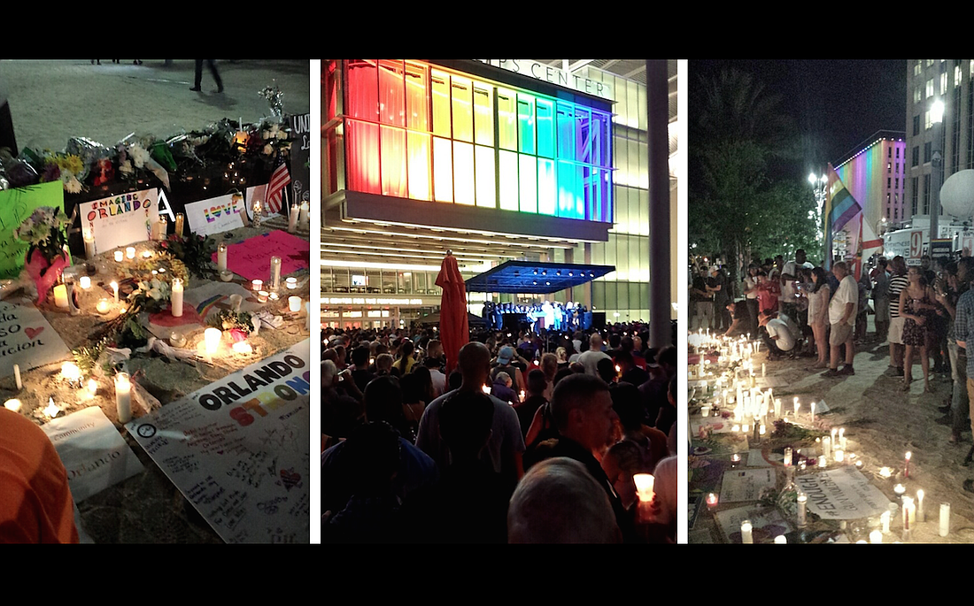 Palm Coast resident Andrew Tyler photographed lit candles and LGBT pride flags displayed outside Orlando's Dr. Phillips Center for the Performing Arts during a vigil for victims of the mass shooting at Pulse, a gay nightclub. (Photos by Andrew Tyler)
