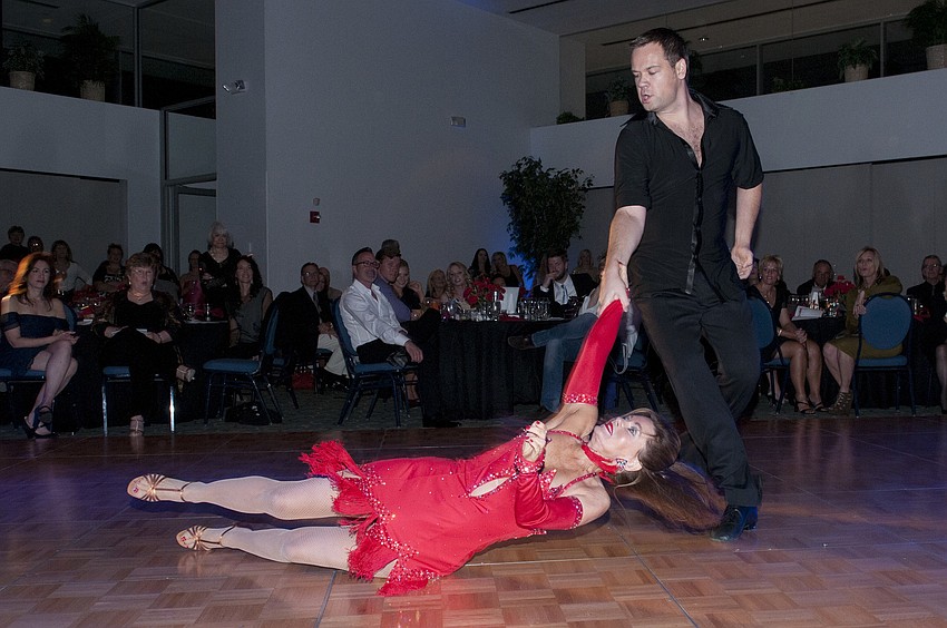 Rita Greenbaum dramatically spun to the floor by Sid Pocius