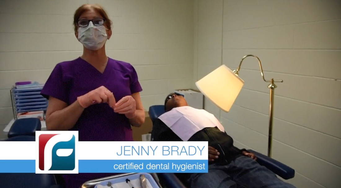 "What we just did on him today, in a private  practice would have been probably about $350," certified dental hygienist Jenny Brady said in a video produced by Flagler Schools about the dental sealant program. (Image taken from school district video)