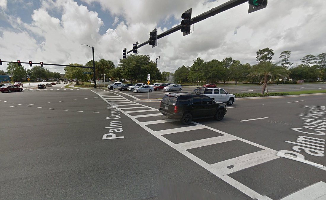 The bicyclist was heading south across Palm Coast Parkway at its intersection with Boulder Rock Drive when he was struck. (Image from Google Maps)