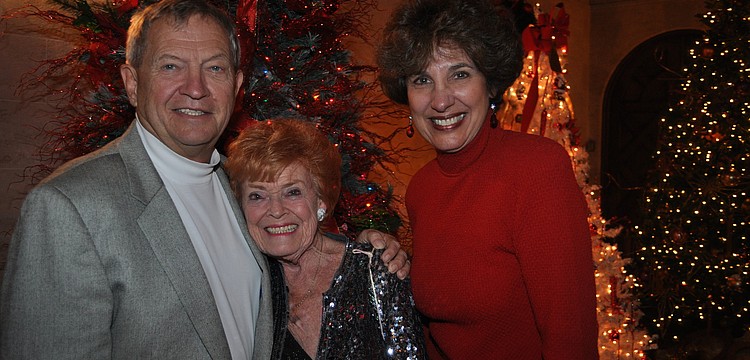 Sen. Mike Bennett, event chairwoman Natalie Gudrun and Dee Bennett