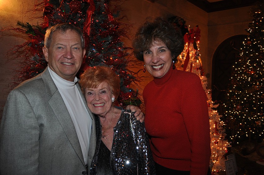 Sen. Mike Bennett, event chairwoman Natalie Gudrun and Dee Bennett