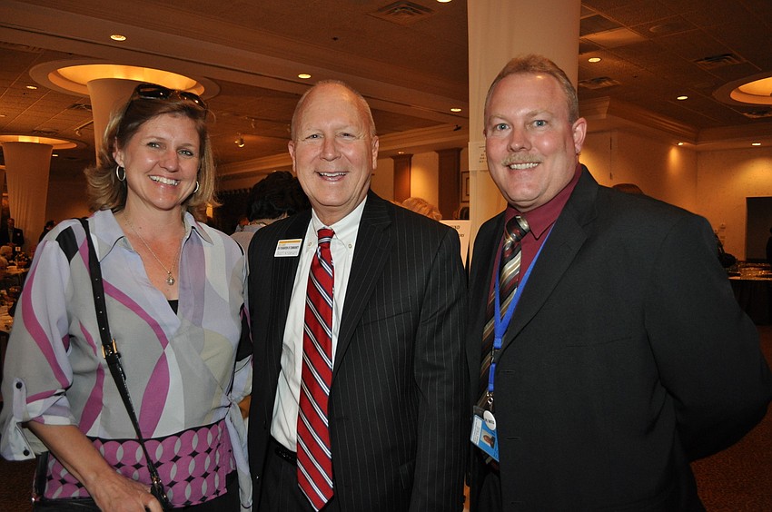 Kim Cartlidge, Scott Anderson and Douglas Staley