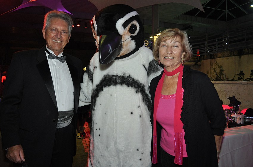 Ron and Ginny Johnson with one of the penguin people