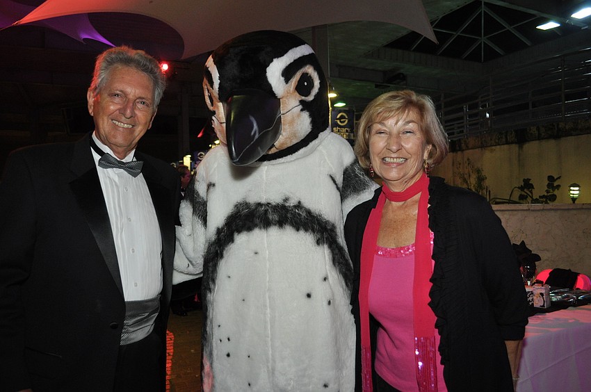 Ron and Ginny Johnson with one of the penguin people