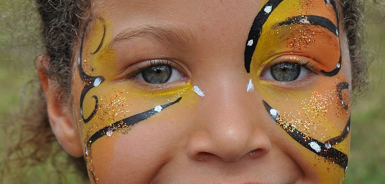 Tanya Wood, 7, got her face painted at the festival.