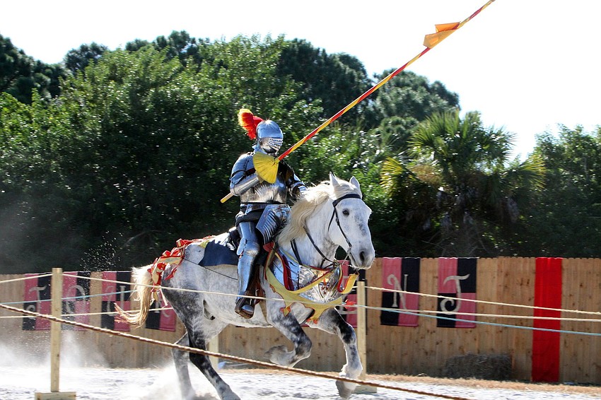A jouster makes his way towards his opponent during a jousting tournament, Sunday, Nov. 13, at the Sarasota Medieval Fair.