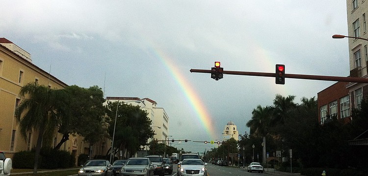 A rainbow emerged from the clouds over Ringling Boulevard. Might it be a sign for a sunshine-filled weekend?