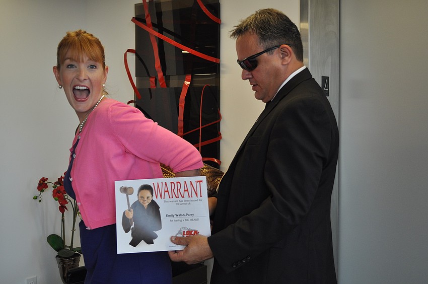 Officer Berliner arrests jailbird Emily Walsh.