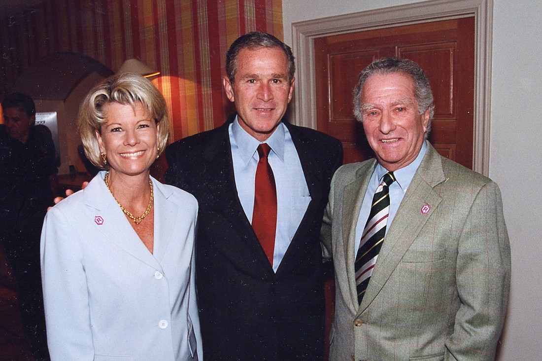 Katie Klauber Moulton and her father, Dr. Murray Ã¢â‚¬Å“MurfÃ¢â‚¬Â Klauber, with President George W. Bush on Sept. 10, 2001, at the Colony. Courtesy photo.