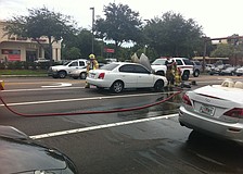 A car caught on fire at the intersection of Bahia Vista and U.S. 41, slowing traffic Thursday afternoon.