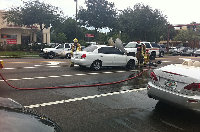 A car caught on fire at the intersection of Bahia Vista and U.S. 41, slowing traffic Thursday afternoon.