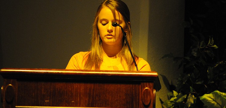 Sixteen-year-old Shelby Graves recited an emotional poem she wrote about keeping the porch light on for a firefighter father who died in the World Trade Center.