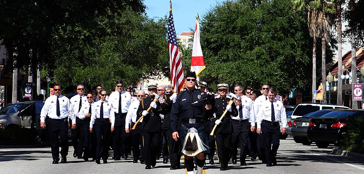 The Sarasota County Firefighters made their way down Main street Sunday, Sept. 11, for the Remembrance March and Celebration.