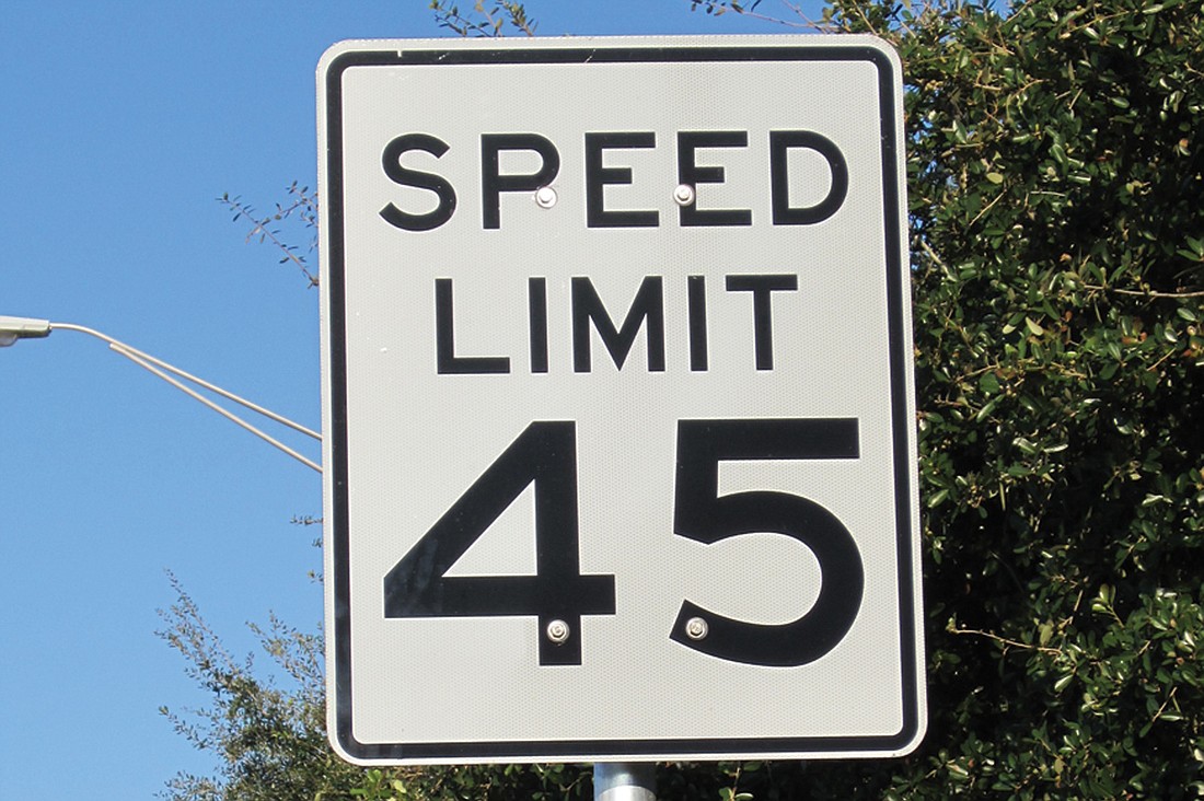 County roads with posted speeds greater than 45 mph soon may be getting new signs as large as 3 feet by 4 feet, so they are more visible to drivers. Photo by Rachel Hackney Brown.