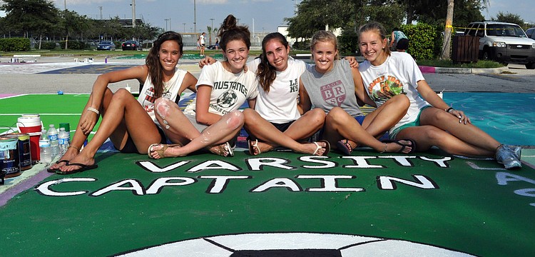 Lakewood Ranch senior soccer players Marissa Milko, Audrey Reinisch, Haley Martin, Kaitlin Deglman and Taylor Halligan made sure to get spaces next to each other.