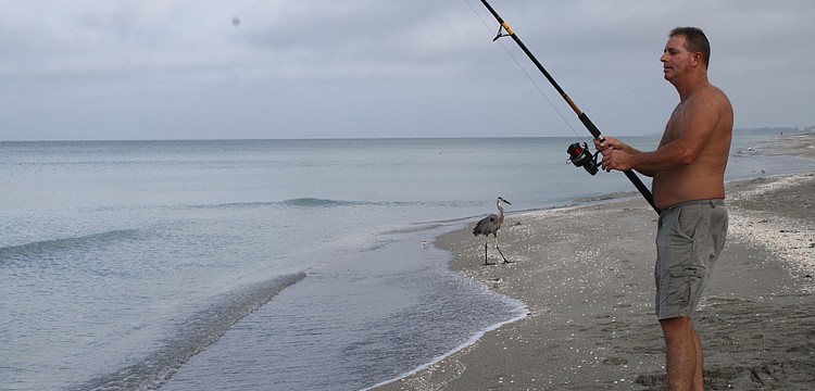 Bob Boyer of Maryland isn't reeling in anything substantial. He gives what he does catch to his bird-friend.