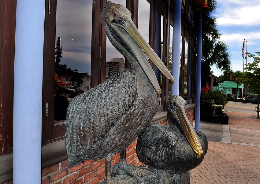 Where is this pelican statue on Siesta Key?