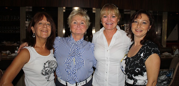 Nina Insinna of Nine Oâ€™ Clocks, Liz Ford of Salon 2000, Pam Canal a Medical Skincare Esthetician, and Irina Lavose a co-owner of Design 2000 pose together.