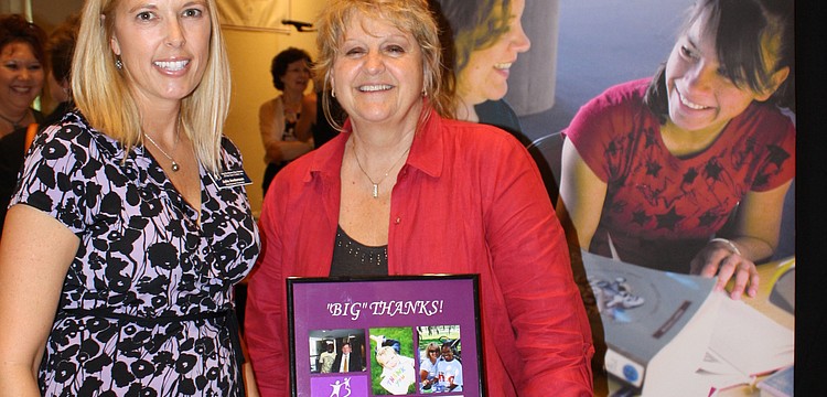 Development Associate Julie Anderson poses with Special Events Coordinator Marlene Hilier for Big Brothers Big Sisters.