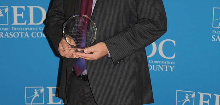 The John Cox Community Partner of the Year Award was presented to Dave Beesley of First Step: Addiction Recovery Program. Presenting the award was President of Halfacre Construction Company Jack Cox and President of Fishman and Associates C.J. Fishman.