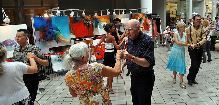 Professional dancers and those who paid to dance enjoyed making their way around the dance floor Sunday, Sept. 25, at Westfield Southgate.