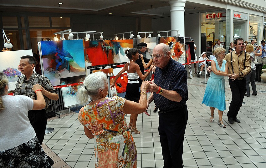 Professional dancers and those who paid to dance enjoyed making their way around the dance floor Sunday, Sept. 25, at Westfield Southgate.