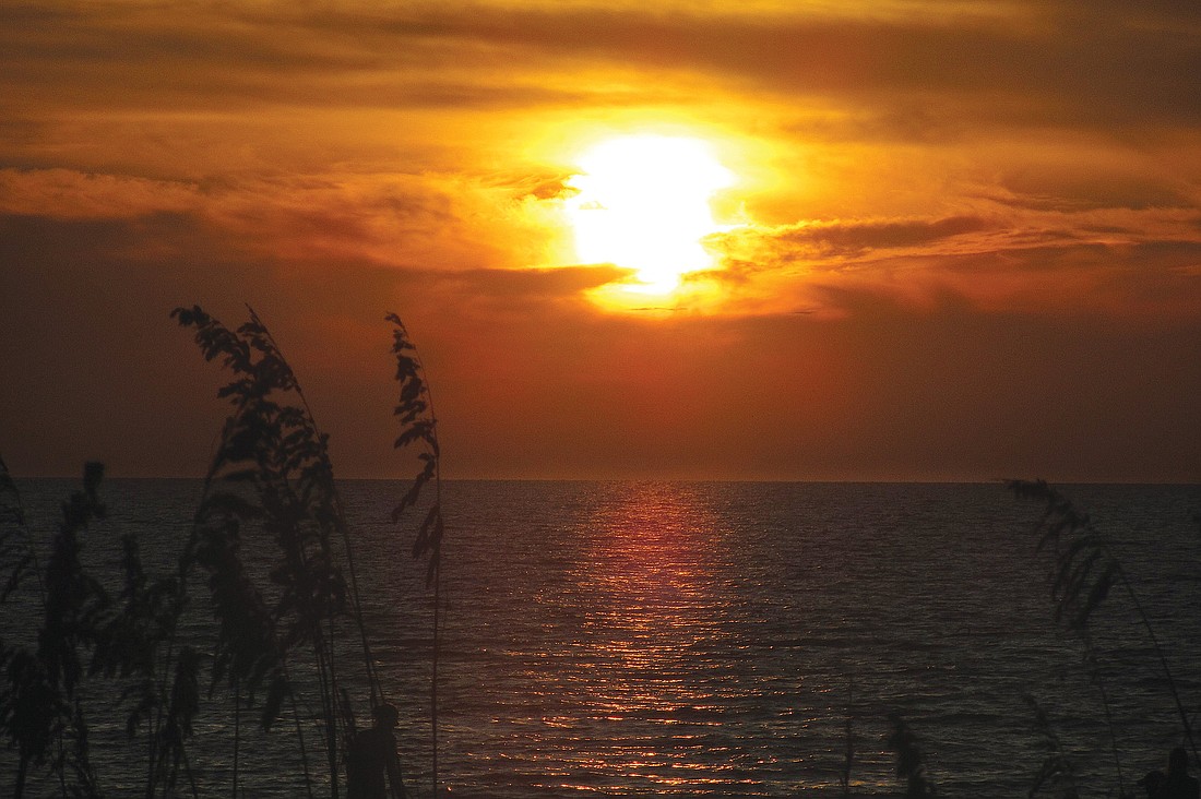 Lakewood Ranch resident Jon Flenniken took this sunset photo Sept. 19, on Holmes Beach.