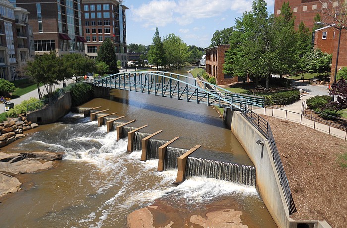 One of the city of Greenville, S.C.Ã¢â‚¬â„¢s most controversial moves involved buying lots behind the Reedy River for mixed-use developments. Photo courtesy of Greater Sarasota Chamber of Commerce.