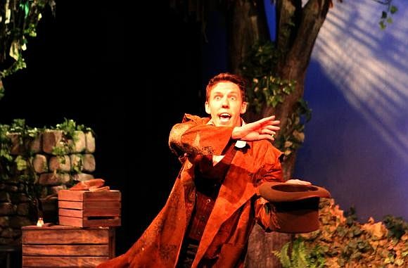 Sholto, Andy McCain, talks to the audience about the day of the great quake and the magical beans he possesses. Photo by Rachel  S. O'Hara.