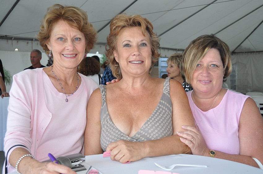 Sharon Thomas and Debbie Namors attend the event in support of model Carol Thomas (middle).