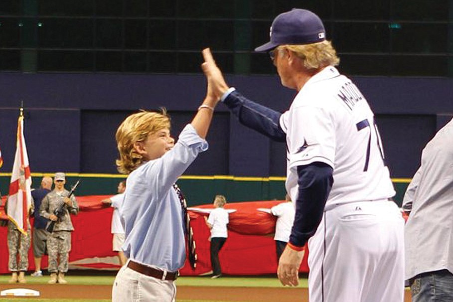 Levi signed the national anthem before the contest. And Ã¢â‚¬â€ even better Ã¢â‚¬â€ he got a high-five from Rays Manager Joe Maddon.