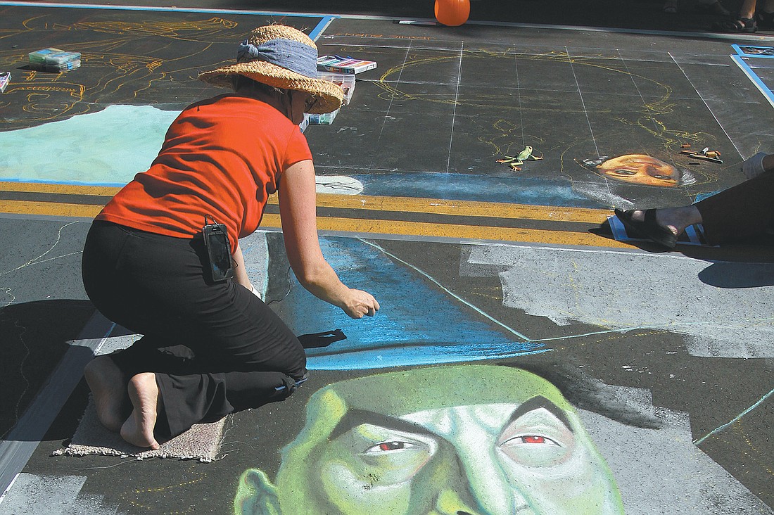 Jennifer Nichols Chaparro's chalk portrait featured the Wicked Witch of the West from "The Wizard of Oz" at last yearÃ¢â‚¬â„¢s Chalk Festival.  File photo.