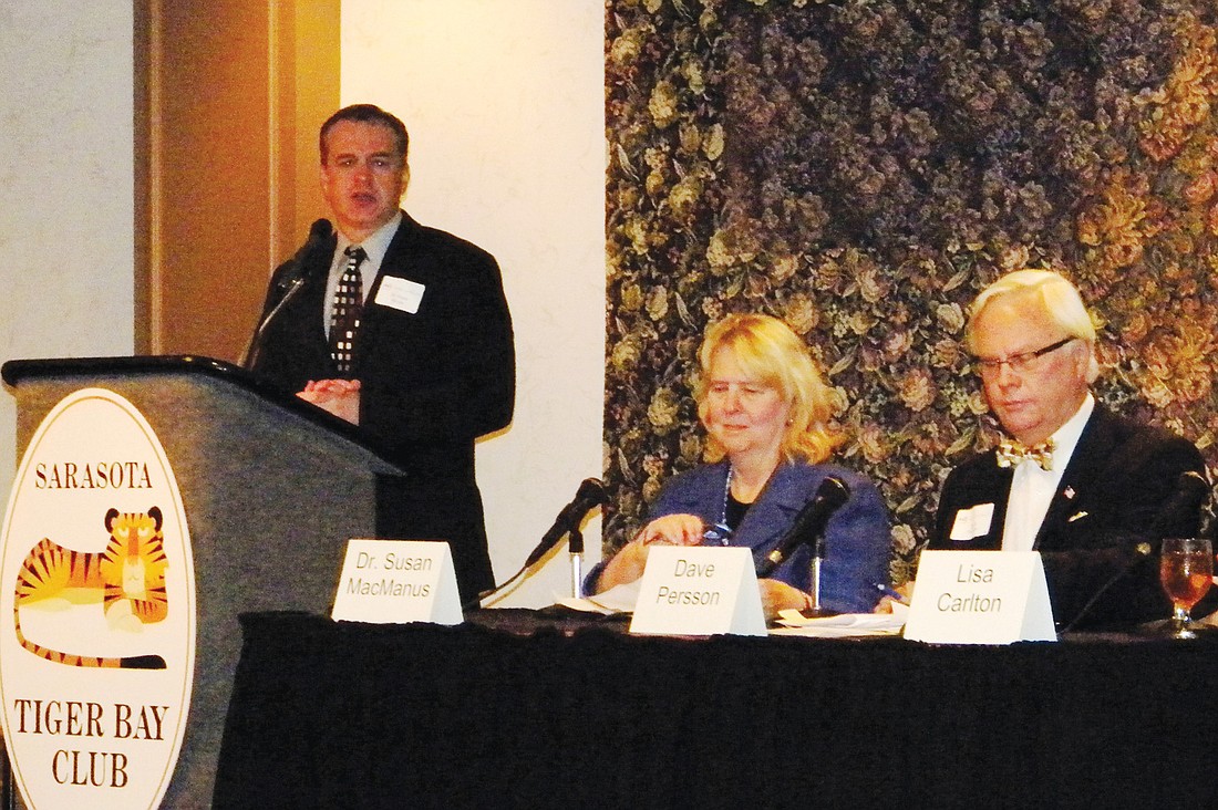 Frank Alcock, a New College professor, serves as moderator of the meeting featuring panelists Susan MacManus of the University of South Florida, Longboat Key Town Attorney David Persson and former state Sen. Lisa Carlton. Photo courtesy of Norm Schimmel.