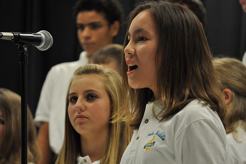 Kaitlin Folsom, 11, sang a solo.