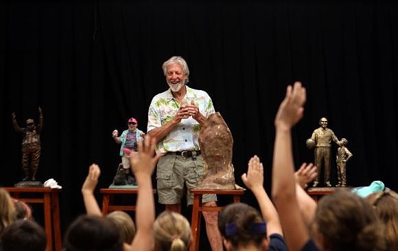 Jack Dowd laughs during a question and answer session with the fourth grade art class Thursday, Oct. 13 at ODA. Photo by Rachel S. O'Hara.