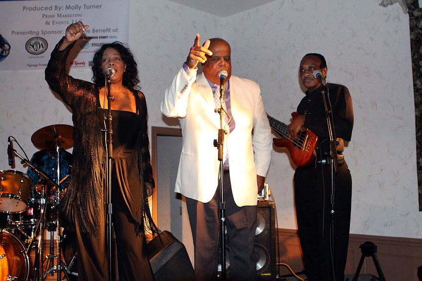 Katt Hefner, Dr. Randall Morgan and Henry D. Hart Sr. rock out Thursday, Oct. 14 during Dr. Idol at Michaelâ€™s on East.