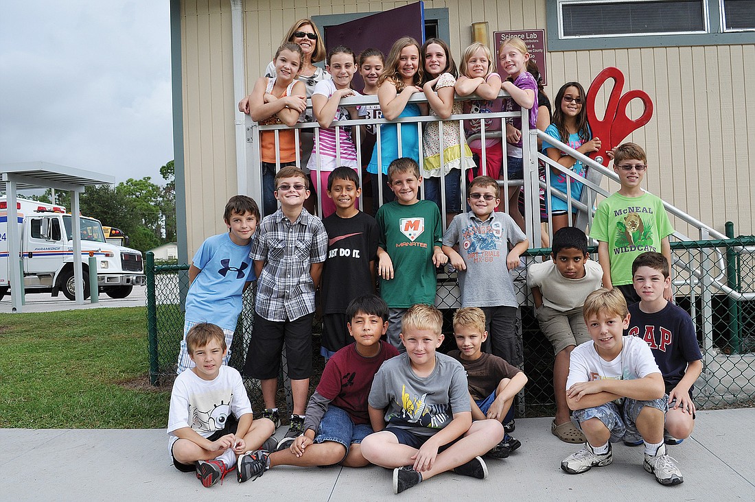 McNeal Elementary School fourth-grade teacher Doris Byal's class gathered Oct. 13 for a picture in front of the schoolÃ¢â‚¬â„¢s new science lab.